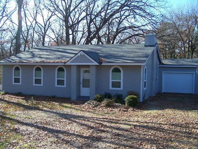 single story home with a garage