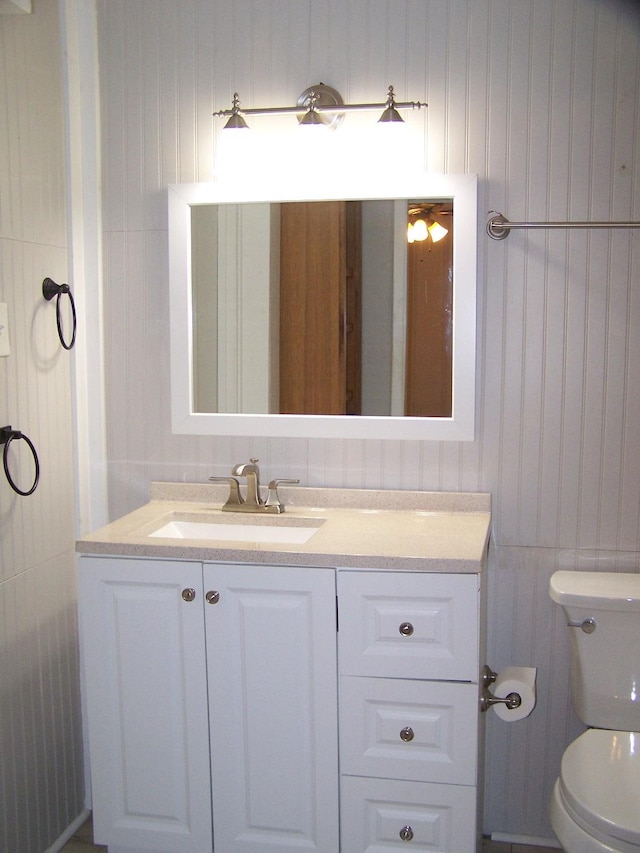 bathroom with vanity and toilet