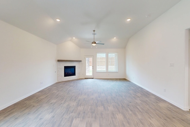 5204 Edge Way, Denton, TX 76226 - unfurnished living room featuring ceiling fan, lofted ceiling, wood finished floors, baseboards, and recessed lighting