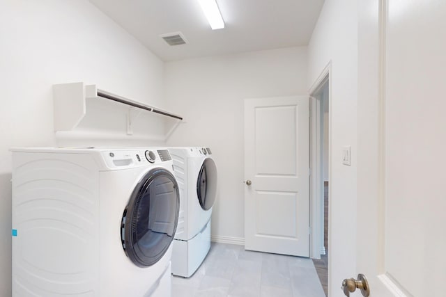 5204 Edge Way, Denton, TX 76226 - washroom featuring washer and clothes dryer and baseboards