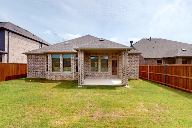 5204 Edge Way, Denton, TX 76226 - rear view of house with brick siding, a patio, and a shingled roof