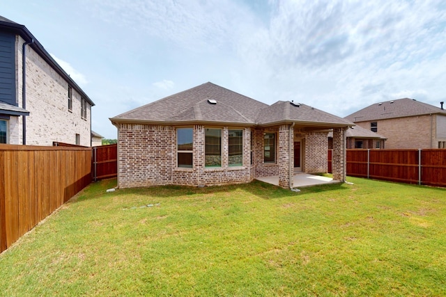 5204 Edge Way, Denton, TX 76226 - back of property featuring brick siding, a patio, and a shingled roof
