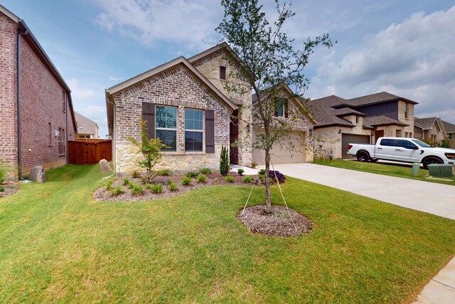 5204 Edge Way, Denton, TX 76226 - view of front of home with stone siding, driveway, and brick siding