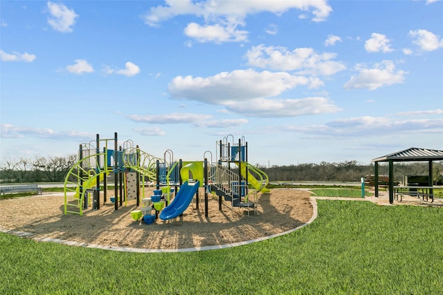 view of playground with a lawn and a gazebo