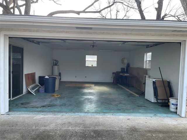 garage featuring electric water heater