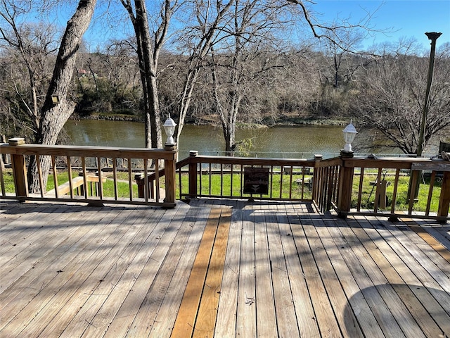 deck featuring a water view