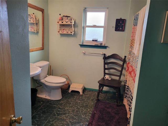 bathroom featuring toilet