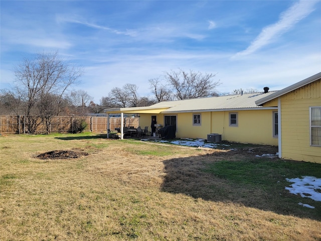 view of yard with central AC unit