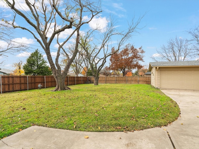 view of yard with a garage