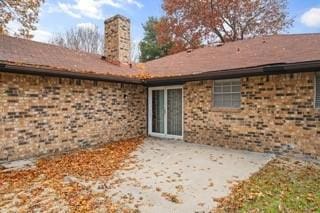 rear view of house featuring a patio area