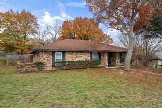 ranch-style house with a front lawn