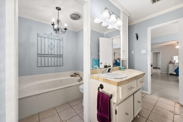 bathroom with vanity, a bathtub, crown molding, tile patterned flooring, and toilet