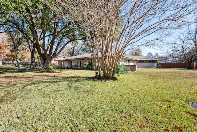 view of front of home with a front yard