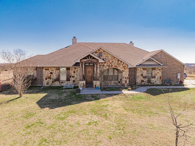 view of front of property with a front lawn