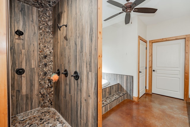 bathroom featuring ceiling fan and tiled shower