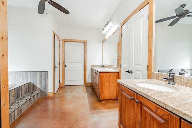 bathroom featuring ceiling fan and vanity