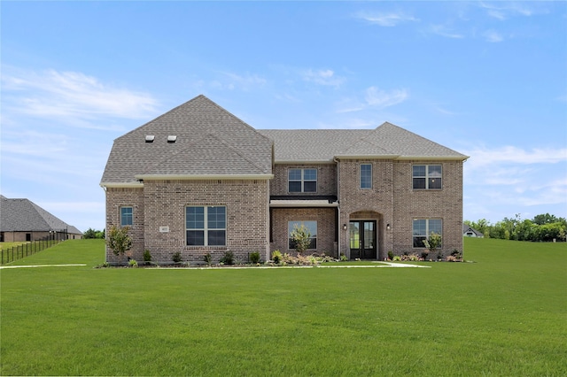 403 Spoonbill Rd, Sunnyvale, TX 75182 - view of front facade featuring a front lawn, brick siding, and a shingled roof