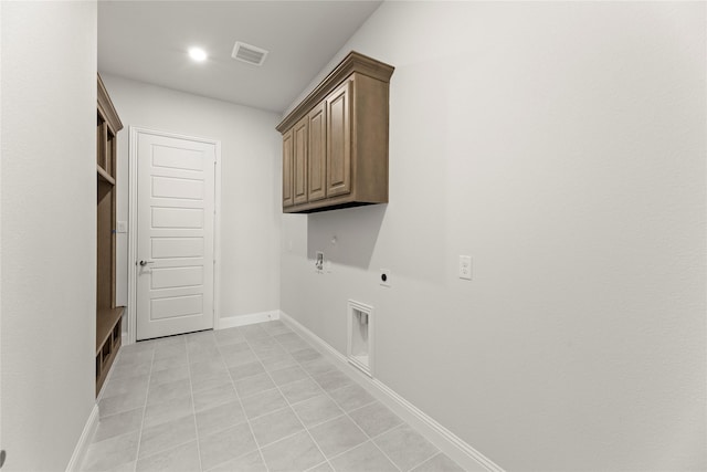 403 Spoonbill Rd, Sunnyvale, TX 75182 - washroom featuring electric dryer hookup, gas dryer hookup, light tile patterned floors, cabinet space, and recessed lighting