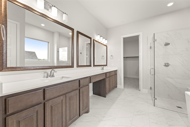 403 Spoonbill Rd, Sunnyvale, TX 75182 - bathroom featuring marble look tile flooring, a marble finish shower, double vanity, a spacious closet, and recessed lighting