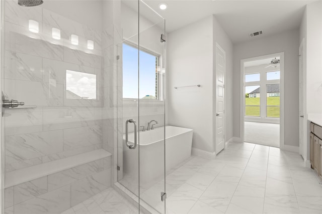 403 Spoonbill Rd, Sunnyvale, TX 75182 - full bathroom featuring marble look tiles, a shower stall, and vanity