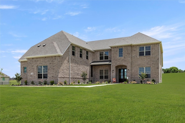 403 Spoonbill Rd, Sunnyvale, TX 75182 - view of front facade with brick siding, a front yard, and roof with shingles