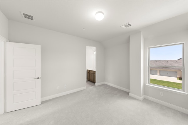 403 Spoonbill Rd, Sunnyvale, TX 75182 - unfurnished bedroom featuring light colored carpet and ensuite bath