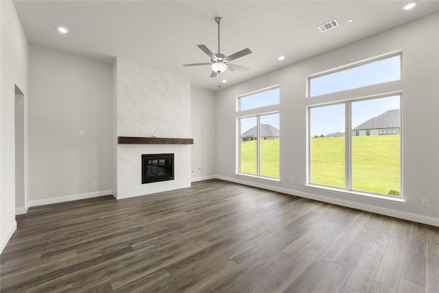 403 Spoonbill Rd, Sunnyvale, TX 75182 - unfurnished living room with a ceiling fan, dark wood-style flooring, recessed lighting, and a premium fireplace