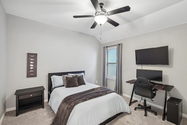 carpeted bedroom with ceiling fan and lofted ceiling