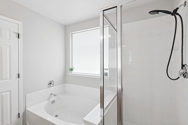 bathroom with independent shower and bath