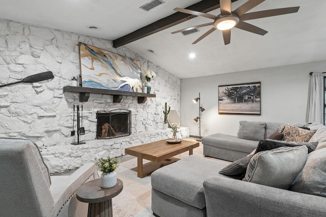 living room with ceiling fan, a fireplace, and lofted ceiling with beams