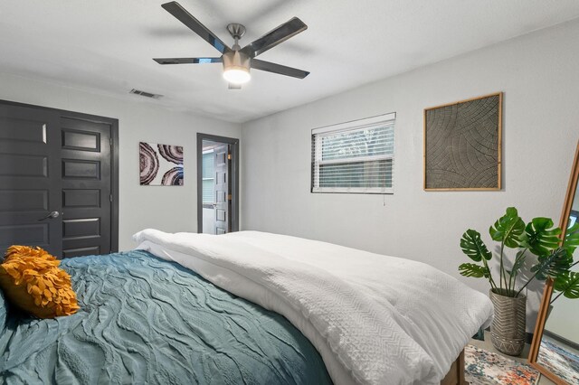 bedroom featuring ceiling fan