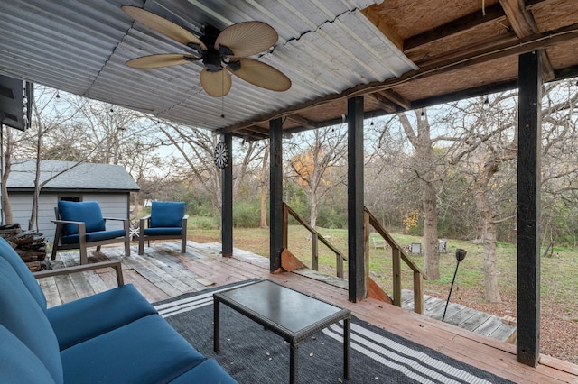 exterior space with ceiling fan