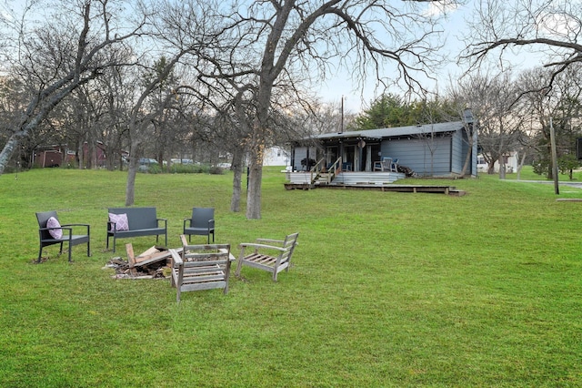 view of yard with a deck