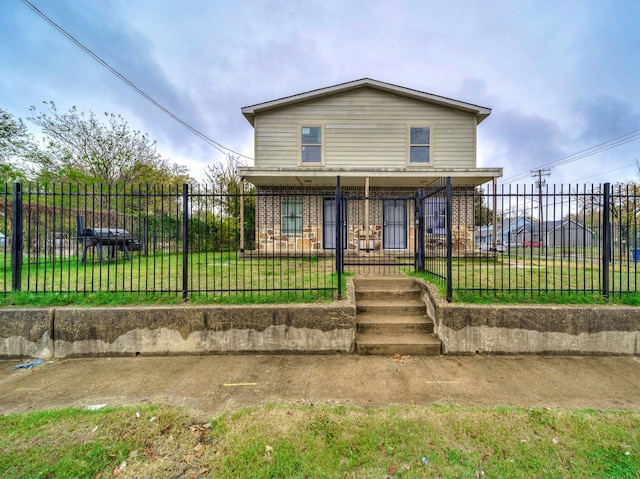 view of front facade with a front yard