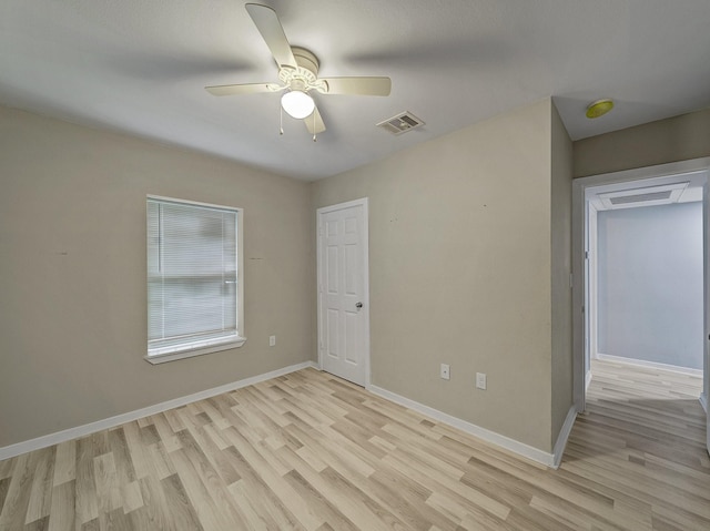 interior space with light hardwood / wood-style floors and ceiling fan