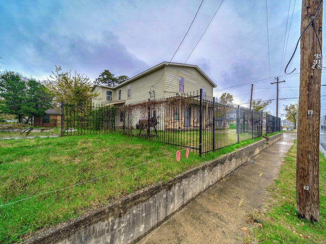 view of home's exterior featuring a yard