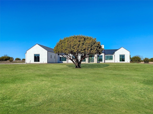 view of front of house with a front yard