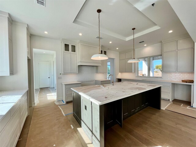 unfurnished room featuring vaulted ceiling with beams and plenty of natural light