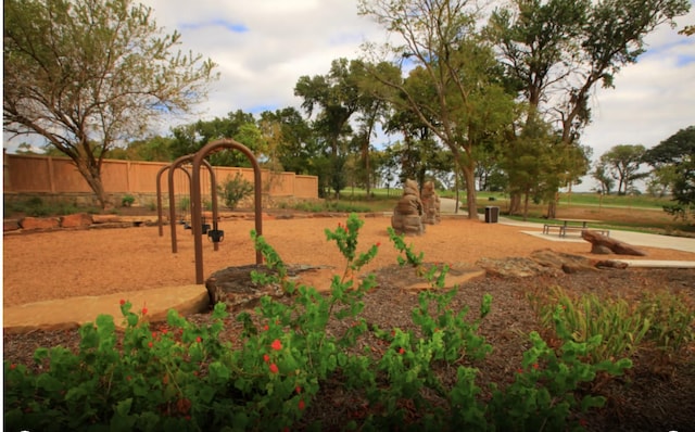 surrounding community featuring a playground