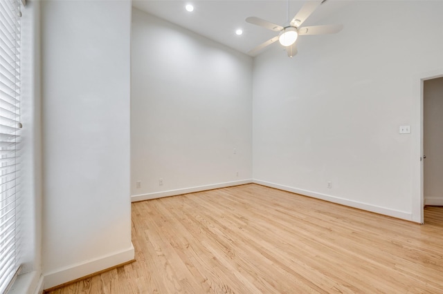 spare room with ceiling fan and light hardwood / wood-style floors