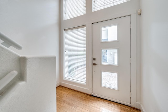 doorway featuring light hardwood / wood-style floors