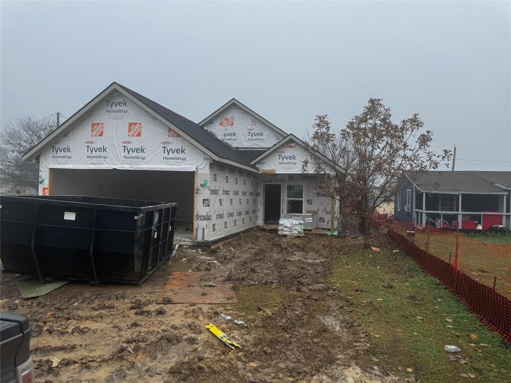 view of front of house with a garage