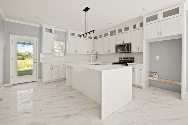 1012 Joe Bailey, Royse City, TX 75189 - kitchen featuring stainless steel appliances, a sink, ornamental molding, light marble finish flooring, and a center island with sink