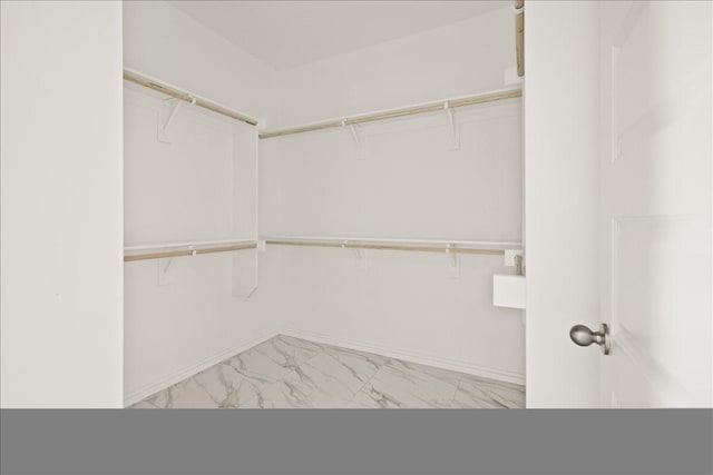 1012 Joe Bailey, Royse City, TX 75189 - spacious closet featuring light marble finish flooring