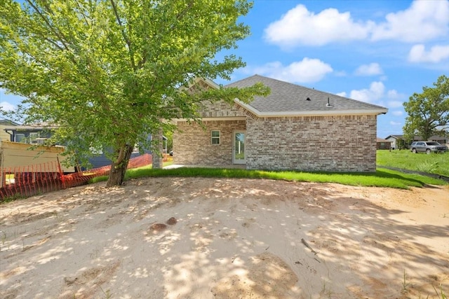 1012 Joe Bailey, Royse City, TX 75189 - back of property featuring brick siding and a shingled roof