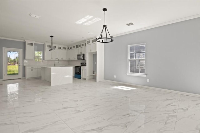 1012 Joe Bailey, Royse City, TX 75189 - kitchen featuring range with electric stovetop, stainless steel microwave, a chandelier, crown molding, and baseboards
