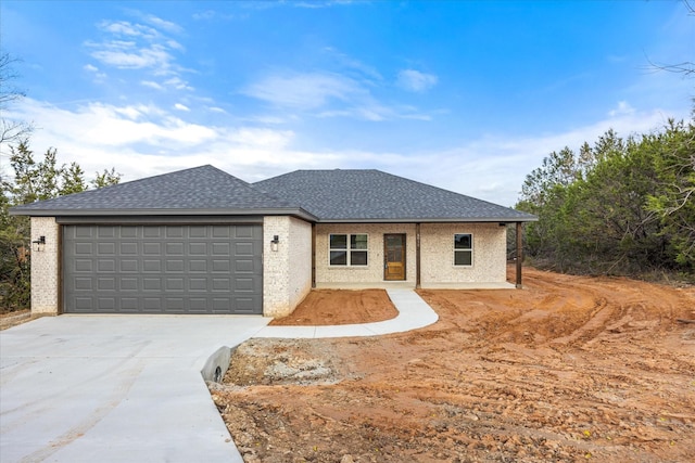 view of front of home featuring a garage