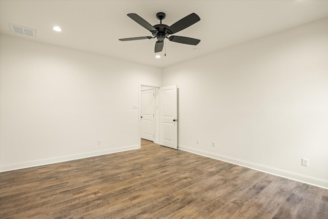 empty room with wood-type flooring and ceiling fan