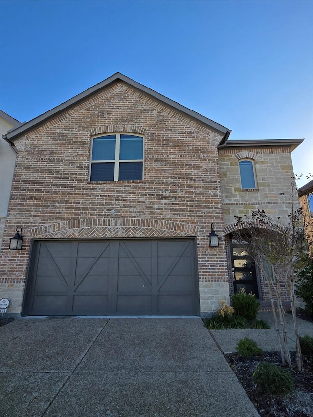 view of property exterior with a garage