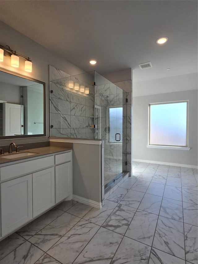 bathroom featuring vanity and walk in shower